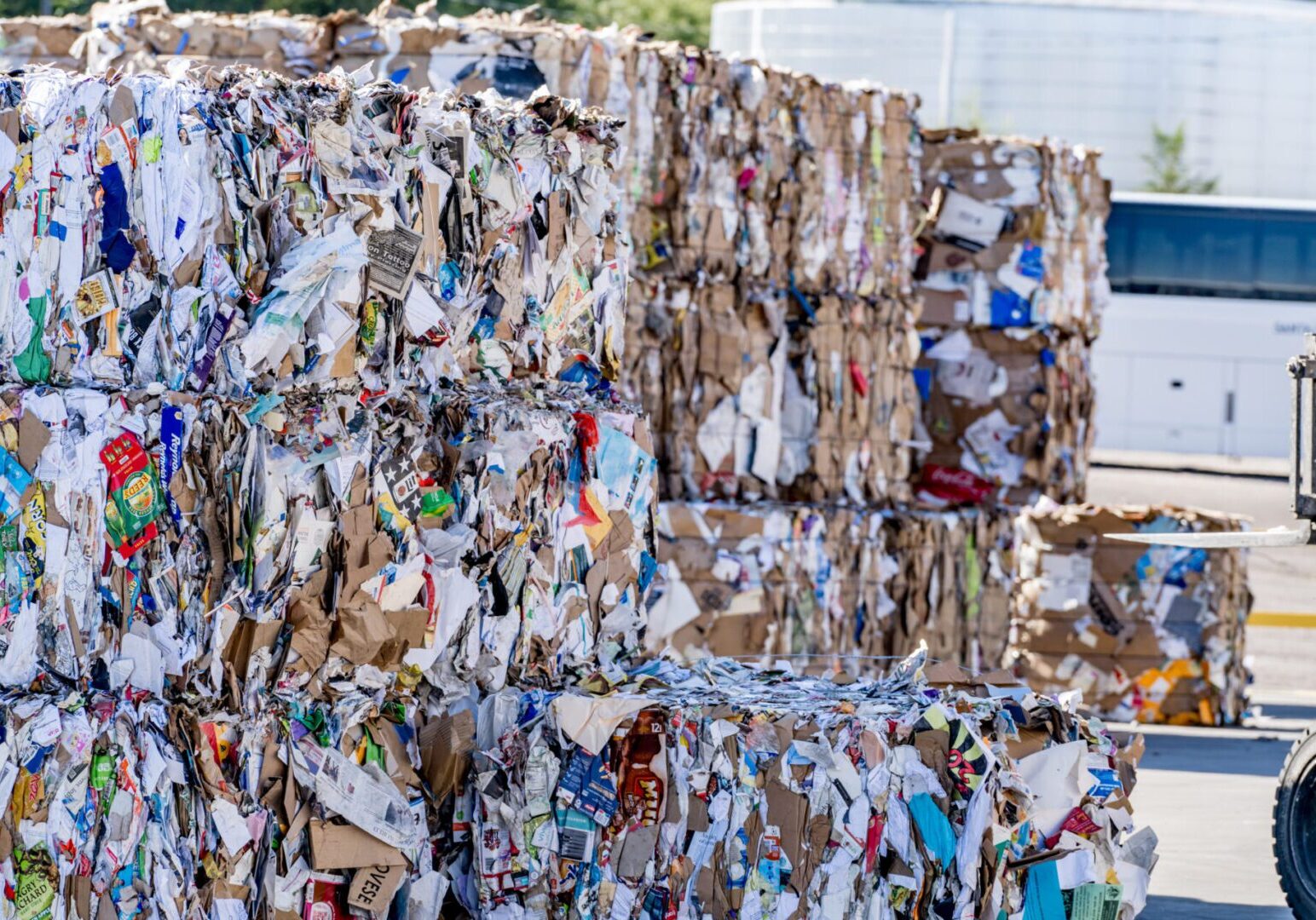 A pile of cardboard is stacked on top of each other.